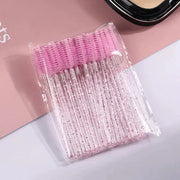 DivaBlush™ CNKESS 50pcs Disposable Eyelash Brushes Extension Crystal Eyebrow Brush Mascara Wand Eye Lashes Cosmetic Tool Set Makeup Beauty